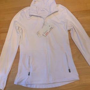 white windbreaker running jacket